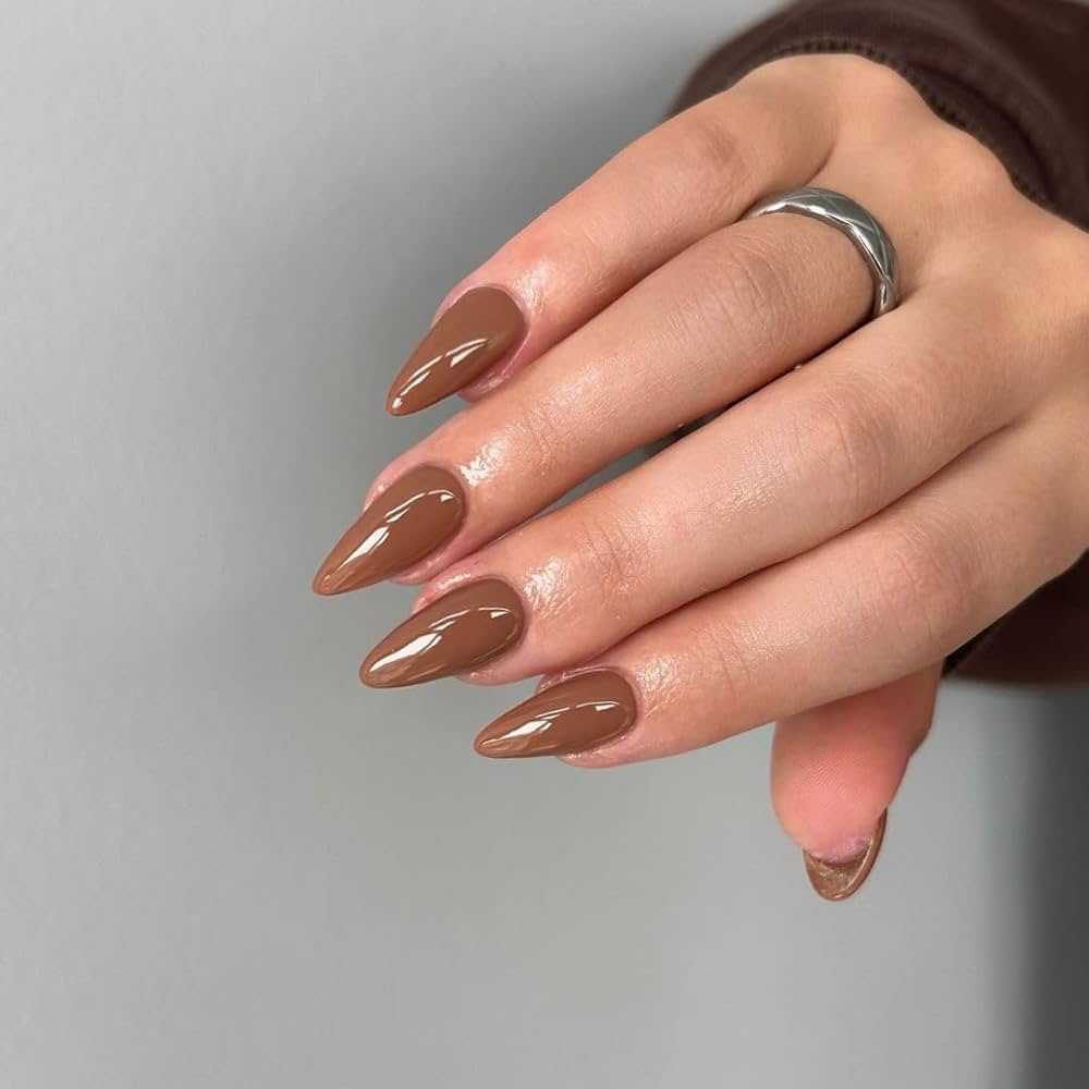 Nail extensions — almond shape, natural length, gel finish