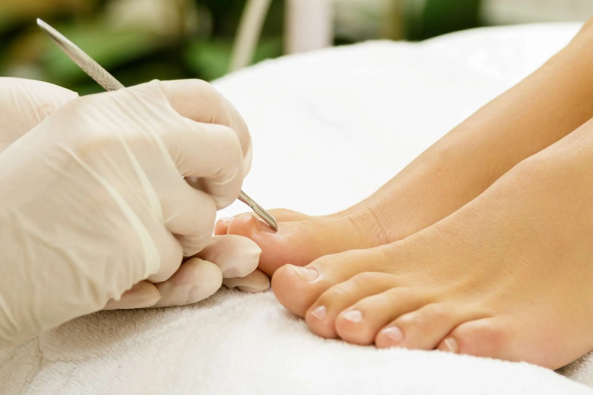 Feet with freshly applied pedicure — maintained and well cared for