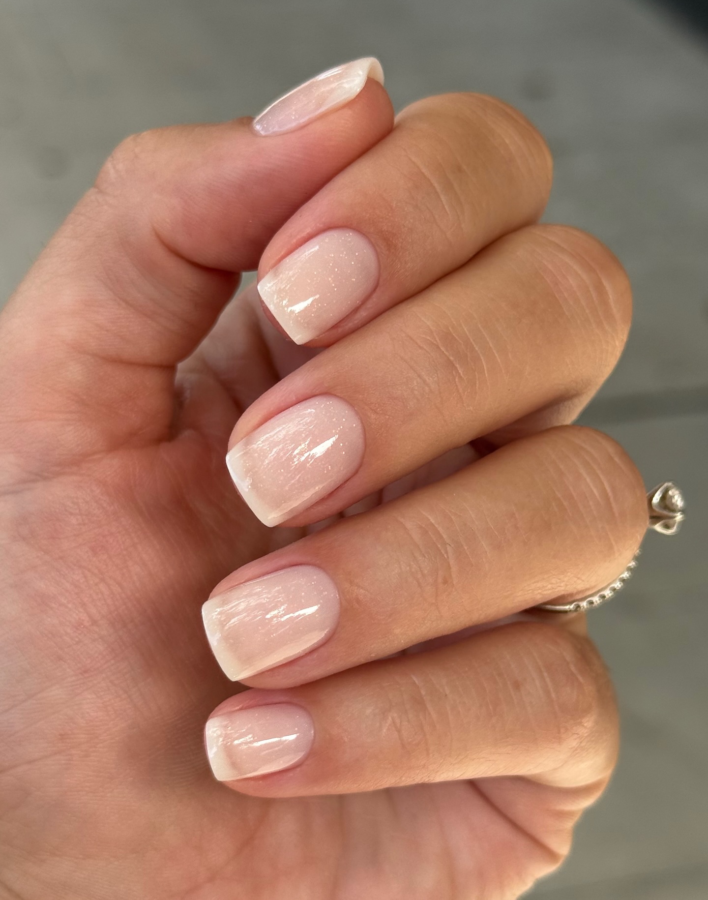 French tip gel manicure — clean white tips on natural base